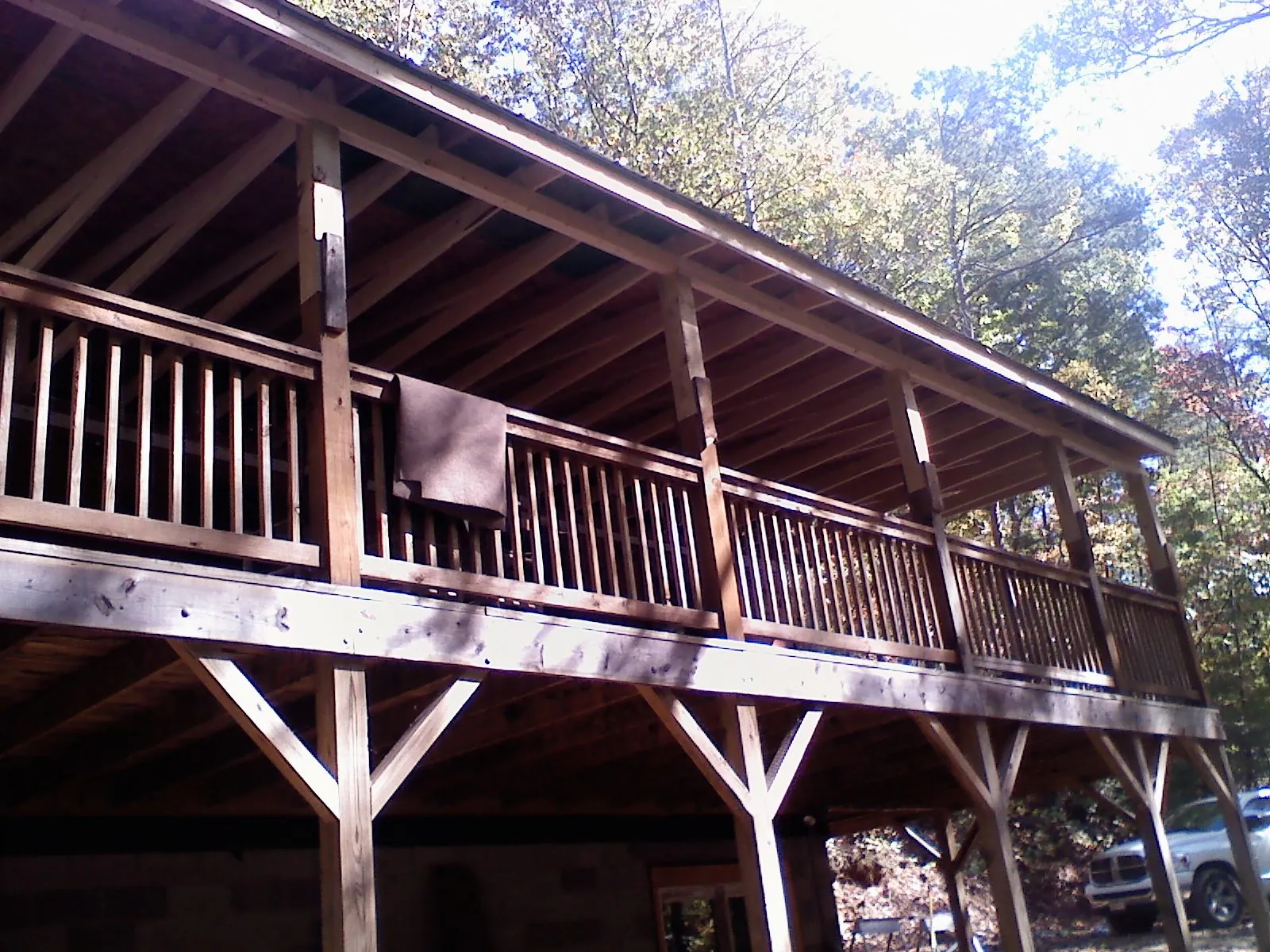 Timber framing under a new elevated porch and deck — Roof Leak Repair in Sardis by Roofing Brothers